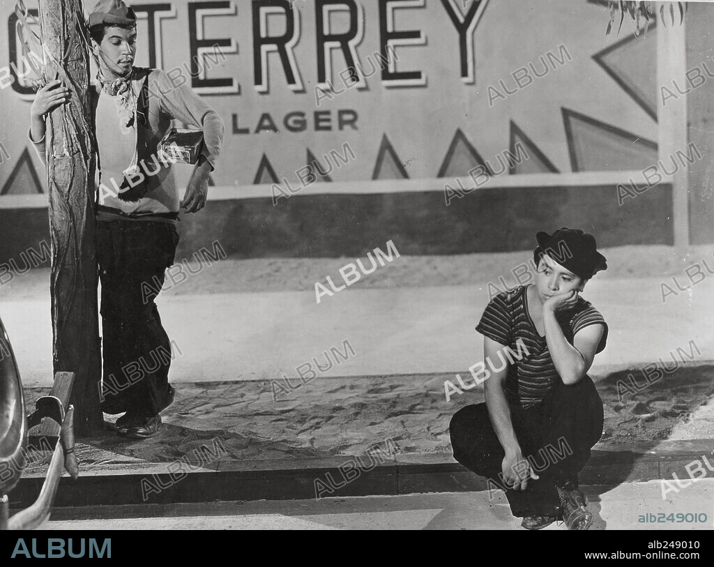 CANTINFLAS and FERNANDO SOTO in NEITHER BLOOD NOR SAND, 1941 (NI SANGRE, NI ARENA), directed by ALEJANDRO GALINDO. Copyright POSA FILMS, S.A.