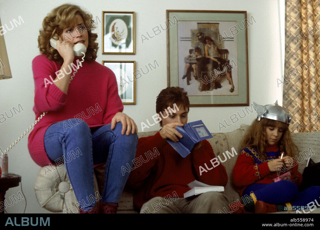 ELISABETH SHUE, KEITH COOGAN and MAIA BREWTON in ADVENTURES IN BABYSITTING, 1987, directed by CHRIS COLUMBUS. Copyright BUENA VISTA.