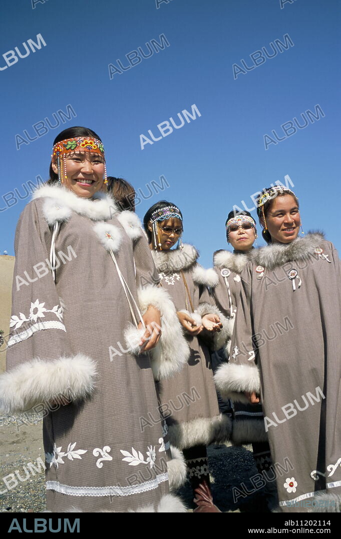 Eskimo women in traditional costume, Lorino village, Chukchi Peninsula, Russian Far East, Russia, Europe.