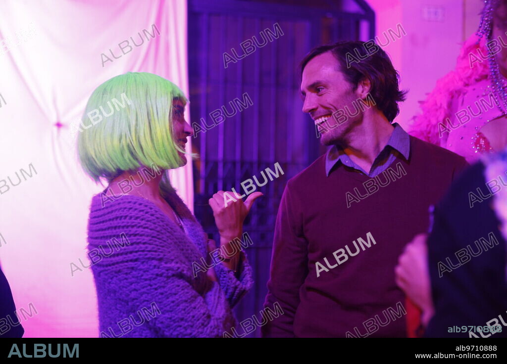 SAM CLAFLIN and VERONICA ECHEGUI in BOOK OF LOVE, 2022, directed by ANALEINE CAL Y MAYOR. Copyright XYZ FILMS.