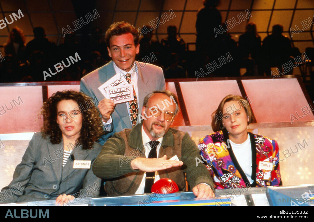 Glück am Drücker, game show, Germany 1992, presenter Al Munteanu with candidates at the buzzer (original german headline: Glück am Drücker).