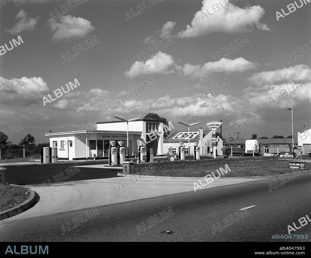 Cleveland Petrol Station, Marr, South Yorkshire, 1963. An early 1960s petrol station in the village of Marr, close to the A1 between Doncaster and Barnsley. The station was run by Clevelend Petrols, which were marketed by an independent company based in north-east England. The name comes from the Cleveland Hills, not from Cleveland, Ohio in the USA. In the 1930s, this company was bought by the Anglo-American Oil Co (Esso), but the Cleveland name was retained, largely as the subsidiary marketed a benzole blend and an alcohol mixture called Discol. In 1973, Esso chose to end Cleveland brand and gave up selling benzole or alcohol blends. Cleveland's 2000 filling stations were soon switched to the Esso brand.