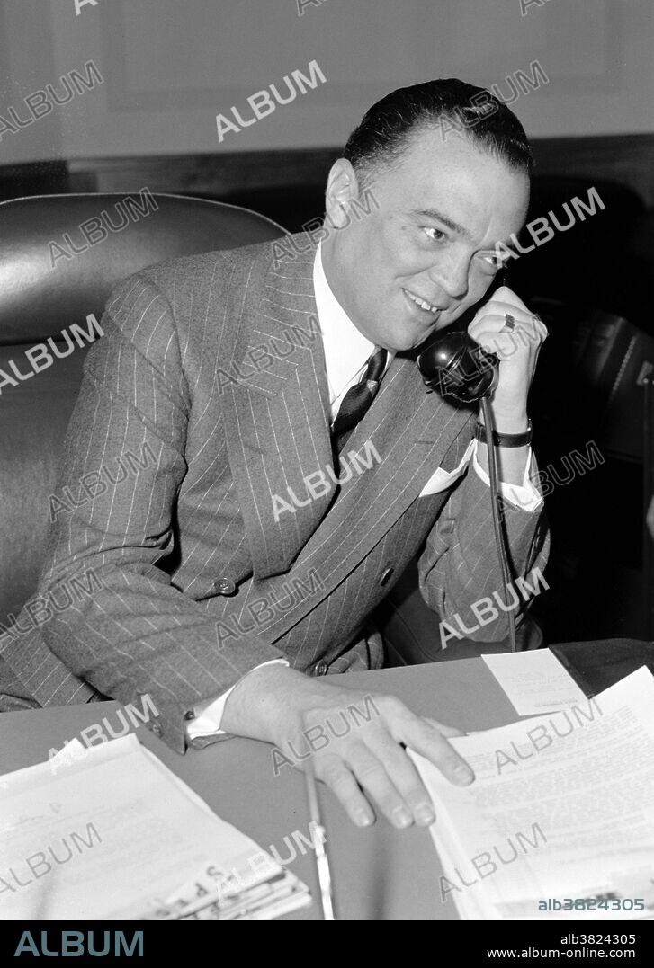Hoover in his office, 1940. John Edgar Hoover (January 1, 1895 - May 2, 1972) was the first Director of the Federal Bureau of Investigation (FBI) of the United States. Appointed director of the Bureau of Investigation - predecessor to the FBI - in 1924, he was instrumental in founding the FBI in 1935, where he remained director until his death. He is credited with building the FBI into a larger crime-fighting agency, and with instituting a number of modernizations to police technology, such as a centralized fingerprint file and forensic laboratories. Late in life and after his death Hoover became a controversial figure, as evidence of his secretive actions became known. He used the FBI to harass political dissenters and activists, to amass secret files on political leaders, and to collect evidence using illegal methods. Hoover consequently amassed a great deal of power and was in a position to intimidate and threaten sitting Presidents. He died in 1972, from a heart attack, at the age of 77. Photographed by Harris & Ewing April 5, 1940.