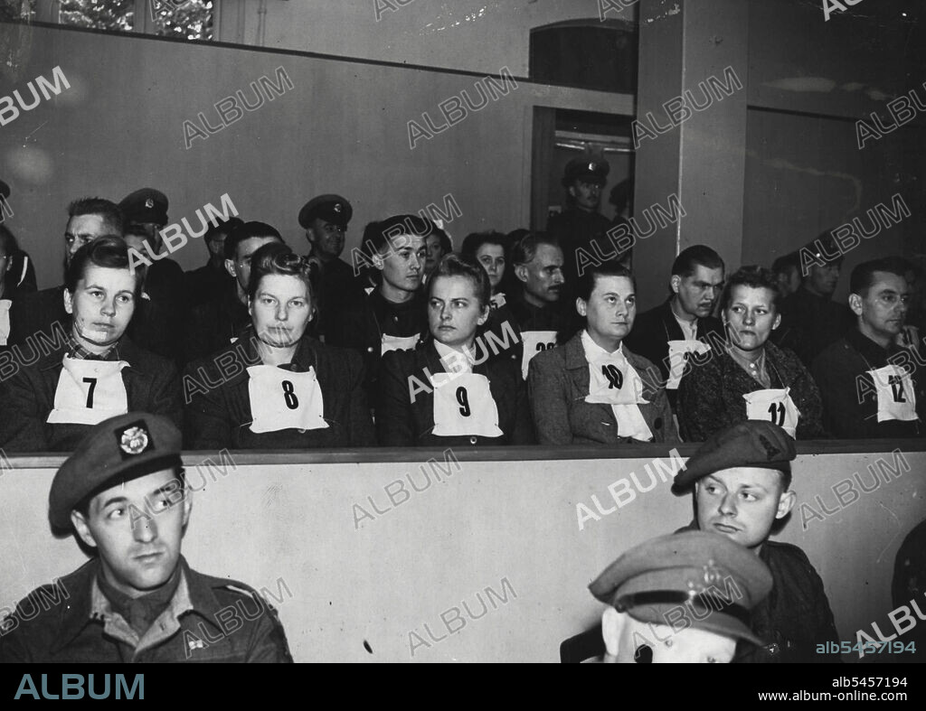 The Belsen Trials -- The accused women photographed in the dock at the opening of the Belsen War criminals at Luneberg to-day. Irma Greese is No. 9 the others are;- Elizabeth Volkenrath (7), Herta Ehlert (8); Hilde Lobauer (11) and Josef (12), Klippel. November 11, 1945. (Photo by LNA).