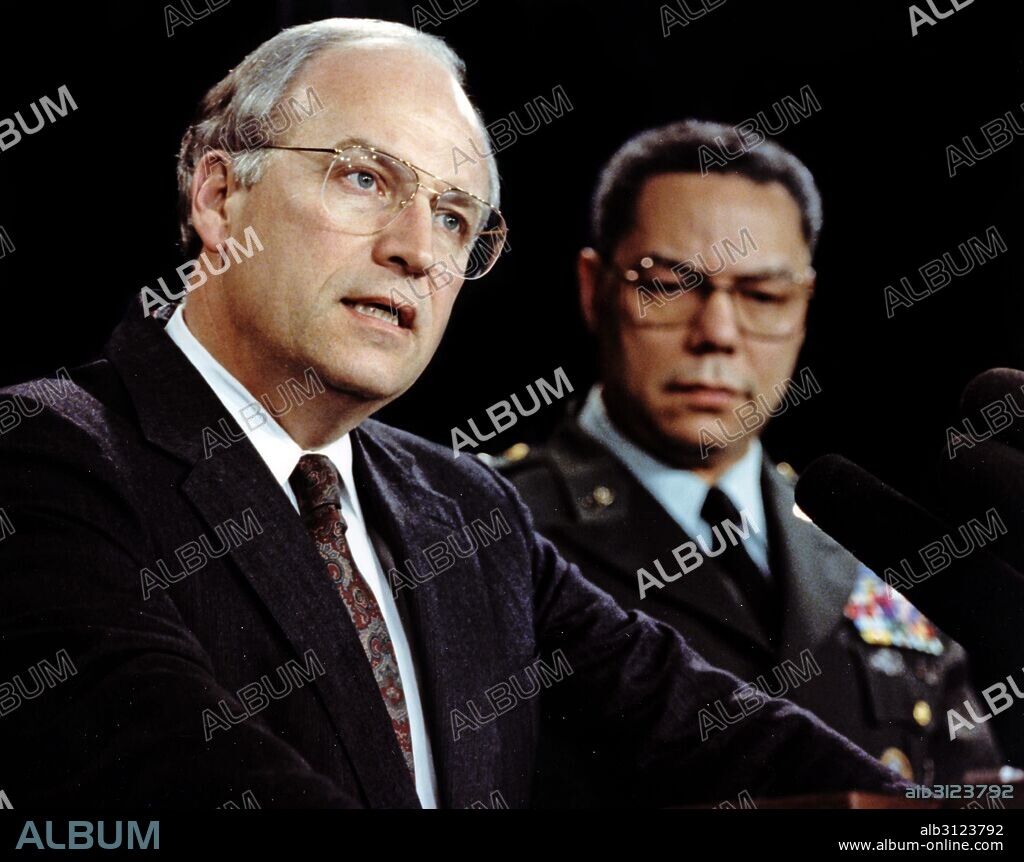 Photograph of Secretary of Defense Dick Cheney (1941-) and Secretary of State Colin Powell (1937-). Dated 1991.