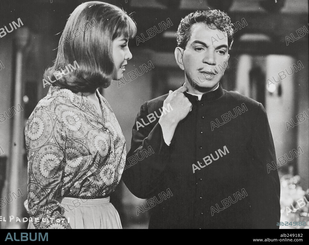 CANTINFLAS and ROSA MARIA VAZQUEZ in THE LITTLE PRIEST, 1964 (EL PADRECITO), directed by MIGUEL M. DELGADO. Copyright POSA FILMS, S.A.