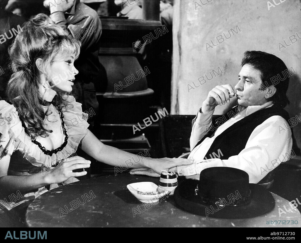 JOHNNY CASH and KAREN BLACK in A GUNFIGHT, 1971, directed by LAMONT JOHNSON. Copyright BRYNA PROD/MGM.