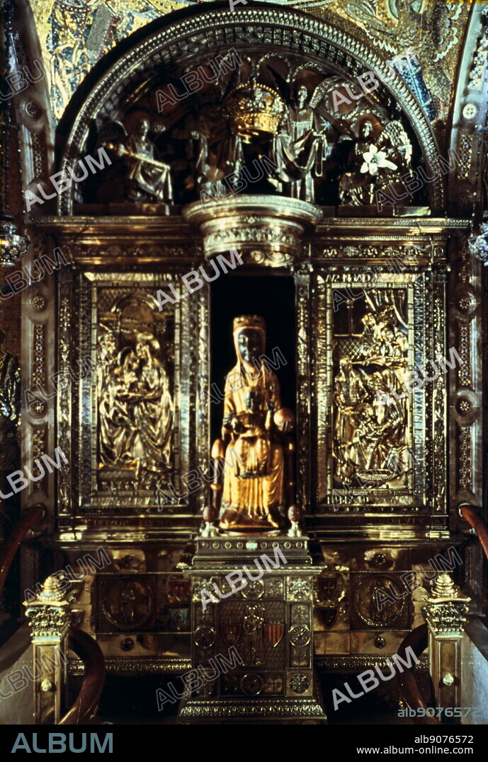 Virgin of Montserrat, Catalonia, Spain. This Black Madonna in the Benedictine Abbey of Montserrat is said to have been carved by St Luke. The Romanesque wooden statue was in fact made at the end of the 12th century. The colour on her face and hands is due to the darkening of the varnish over time.
