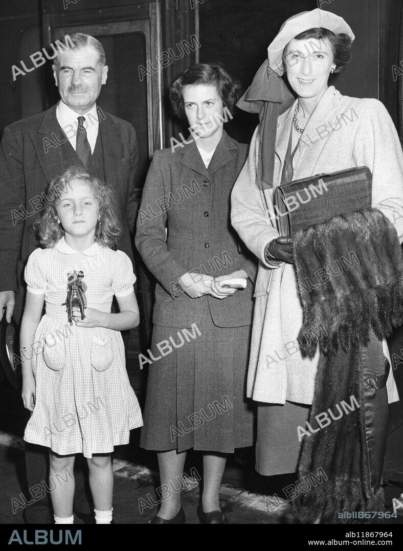 Britain's new High Commissioner of Canada , Lieutenant-General Sir Archibald Nye , his wife , 7 year old daughter Harriet and stepdaughter Miss Sheila Stevenson , 20 , leave Euston station , London on the Empress of Canada boat train for Canada .12th August 1952.