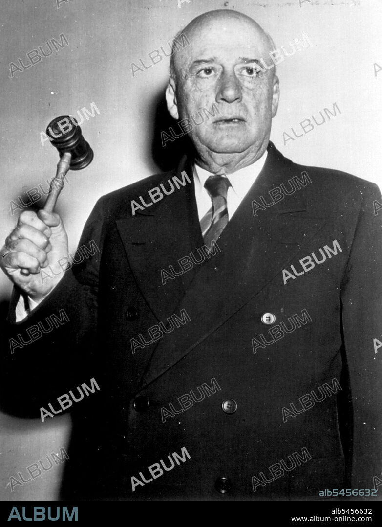 New Speaker -- Rep. Sam Rayburn (D-Tex) Poses with gavel upraised after his election today as speaker of the house of representatives. January 3, 1948. (Photo by AP Wirephoto).