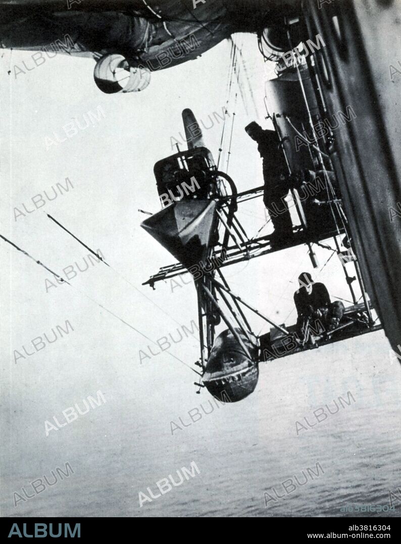 At the start of WWI the powerful British Fleet was effectively driven out by a few German submarines to find safer hiding places far from the North Sea. This opened up the whole of the East coast of England to hostile attack by air and sea. British airships were to prove a formidable deterrent to the U-boat while performing reconnaissance, patrolling, mine-hunting and convoy escort duties. Hunting subs over the North Sea was cold work for English dirigible crews. Lewis gunners, who perched out in the open on platforms under the propellers while other crew members looked for dark shapes or oil slicks of submerged subs. When they found a U-boat they guided Destroyers; depth charge attacks and often dropped their own bombs. The NS class (North Sea) were largest and most effective nonrigid airships in British service. These had a gas capacity of 360,000 cubic feet, a crew of 10 and an endurance of 24 hours. Six 230 pound bombs were carried, as well as three to five machine guns.