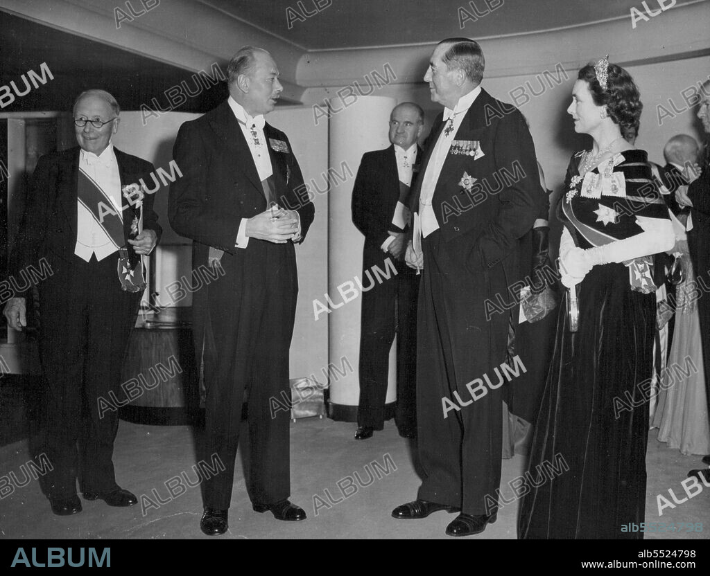 Slim Celebrates Australia Day With Duke And Duchess --The Duke and Duchess of Gloucester with Sir Clive Baillieu (second from right) and Sir Thomas Dunhill (extreme left), the Australian surgeon, at the Savoy to-night. Field-Marshal Sir William Slim is seen in Background.Both Sir Clive (an Australian from Melbourne) and Sir Thomas are members of the Australia Club committee.Field-Marshal Governor General-designate of Australia, and Lady Slim were guests of honor to-night (Monday) at an Australia Club dinner attended by the Duke of Gloucester, President of the Club, and the Duchess, at the Savoy Hotel, London. The dinner was in celebration of  Australia Day, 165th anniversary of the foundation of the first settlement in Australia on January 26, 1788. January 26, 1953.