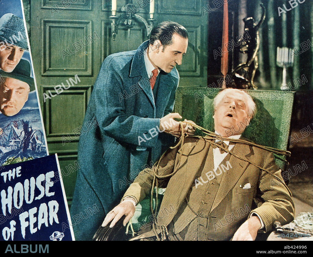 BASIL RATHBONE and NIGEL BRUCE in SHERLOCK HOLMES AND THE HOUSE OF FEAR, 1945, directed by ROY WILLIAM NEILL. Copyright UNIVERSAL PICTURES.