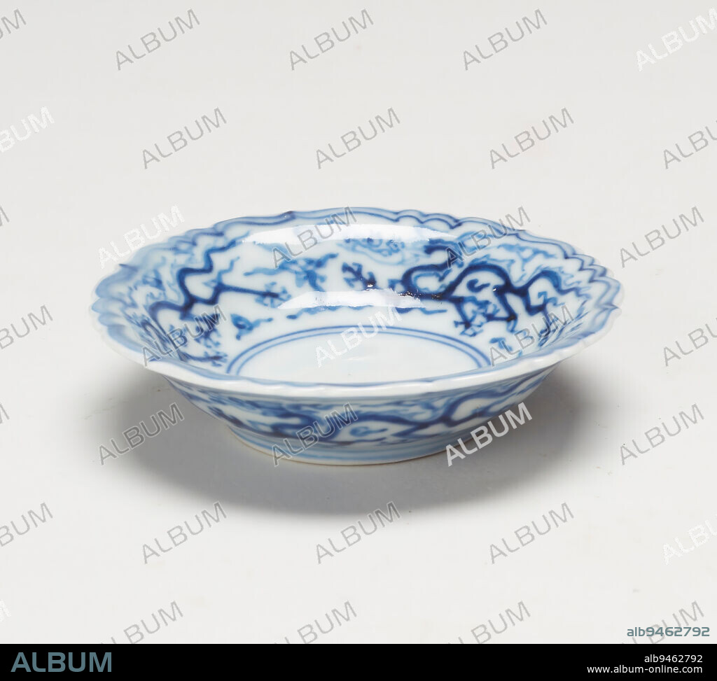 Dish, 16th century, 9/16 x 2 7/8 x 2 7/8 in. (1.43 x 7.3 x 7.3 cm), Glazed porcelain, China, 16th century, Emperor Jiajing was a devout Daoist and Daoist symbolism became a common decorative element during his reign. In Daoist mythology, dragons were symbolic of yang, the male principle, spring, rain, and the East. This small dish shows dragons cavorting amid clouds. A unique feature for Jiajing period is the use of huiqing or Mohammedan blue, a form of imported cobalt which is purplish-blue in color tone. However, this form of cobalt tended to smudge during the firing process. By mixing imported cobalt with cobalt was mined locally, potters were able to produce the bright blue seen here, while still maintaining the crisp quality of their painted designs.
