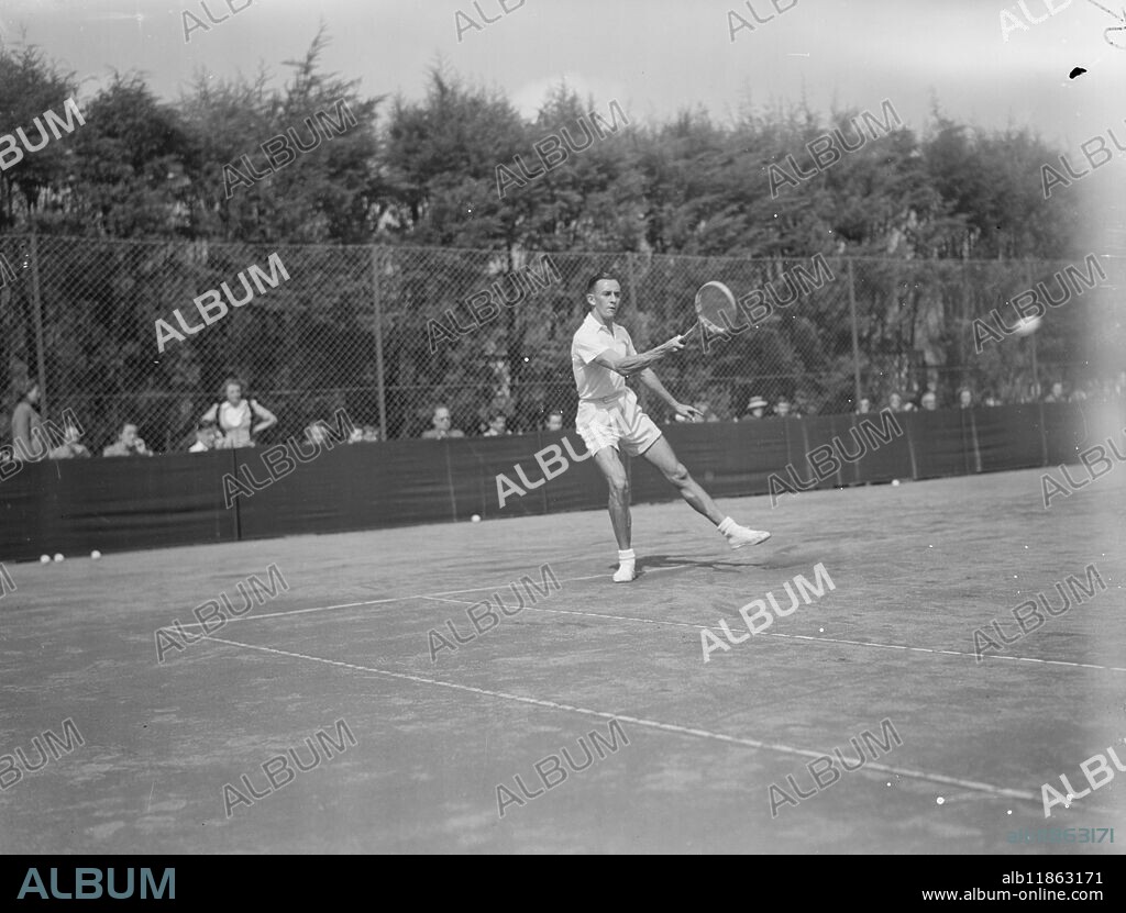 Eric Sturgess, South Africa's No.1 player, in action against G.Godsell, who he beat by two straight sets in the Sutton Hard Courts Championships, which opened at Sutton, Surrey, today (Monday). 19th April 1948.
