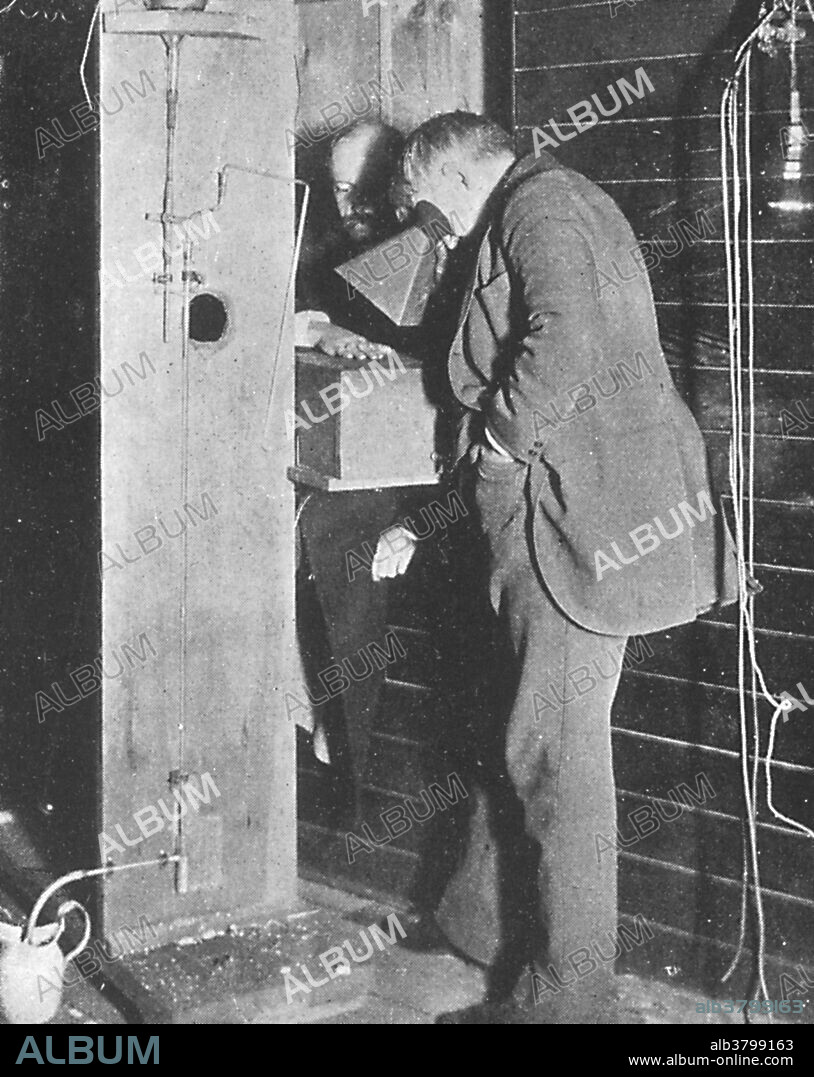 Thomas Edison examines Clarence Dally's, his assistant, hand thru a fluoroscope of his own design. Edison began a series of x-ray experiments immediately on learning of Roentgen's discovery. He tested hundreds of luminescent substances before choosing the most effective. The main apparatus, left, is a Sprengel vacuum pump. A fluoroscope is a radiologic instrument equipped with a fluorescent screen on which opaque internal structures can be viewed as moving shadow images formed by the differential transmission of x-rays through the body. Thomas Alva Edison (1847-1931) who was an American inventor, famous for inventing or improving devices such as the phonograph and the electric light bulb. Edison was one of the first inventors to build research laboratories to make and develop inventions. He also founded several companies, and filed over 1000 patents. Other work included improvements to telegraphy, cameras, and motion picture cameras, as well as promoting his DC electrical distribution systems. He also discovered the Edison Effect, on which thermionic valves are based.