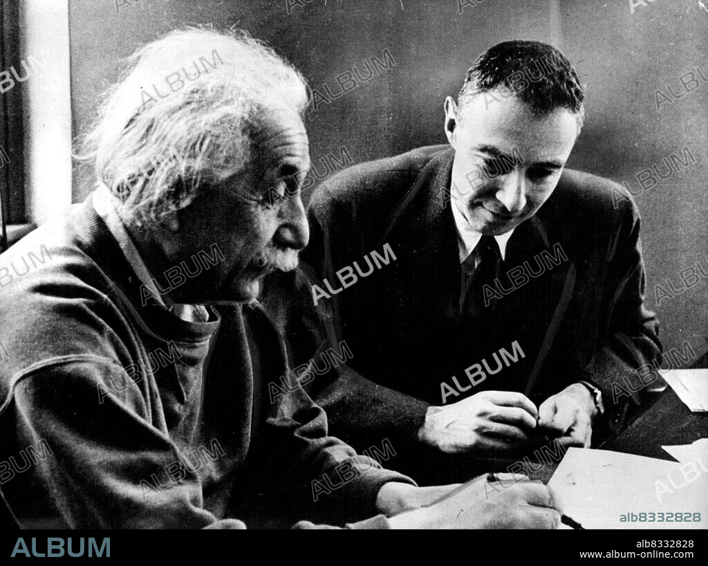 Einstein Has "Greatest Respect" For Banned Atom Scientist.Professor Einstein (left) Tells Dr. Robert Oppenheimer about his attempts to ***** latter in ***** is of space. Picture taken in 1949 when Dr. Opponheimer was director of the institute for Advanced study at Princeton, N.J.When told that Dr. J. Robert Oppenheimer, 49, America's foremost atomic scientist has been barred from all secret information while a new investigation was made of his supposed links with communism, Professor Einstein Said, "All I can say is i have the greatest respect and Warnest feelings for him. April 19, 1954. (Photo by Paul Popper, Paul Popper Ltd.).