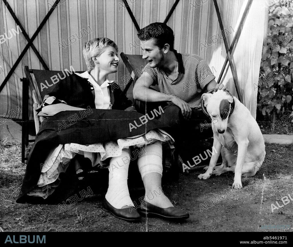 Jill Ireland leaves Hospital:Jill Ireland with her legs still in bandaged with a bearded Richard Lyon at her parents home.19 year old starlett Jill Ireland, who with Richard Lyon was injured with Richard Lyon, son of Bebe Daniel and Ben Lyon, was injured in an car accident a couple of weeks ago left hospital today. August 06, 1955.