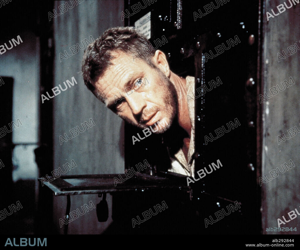 STEVE MCQUEEN in PAPILLON, 1973, directed by FRANKLIN J. SCHAFFNER. Copyright CORONA/ALLIED ARTISTS.