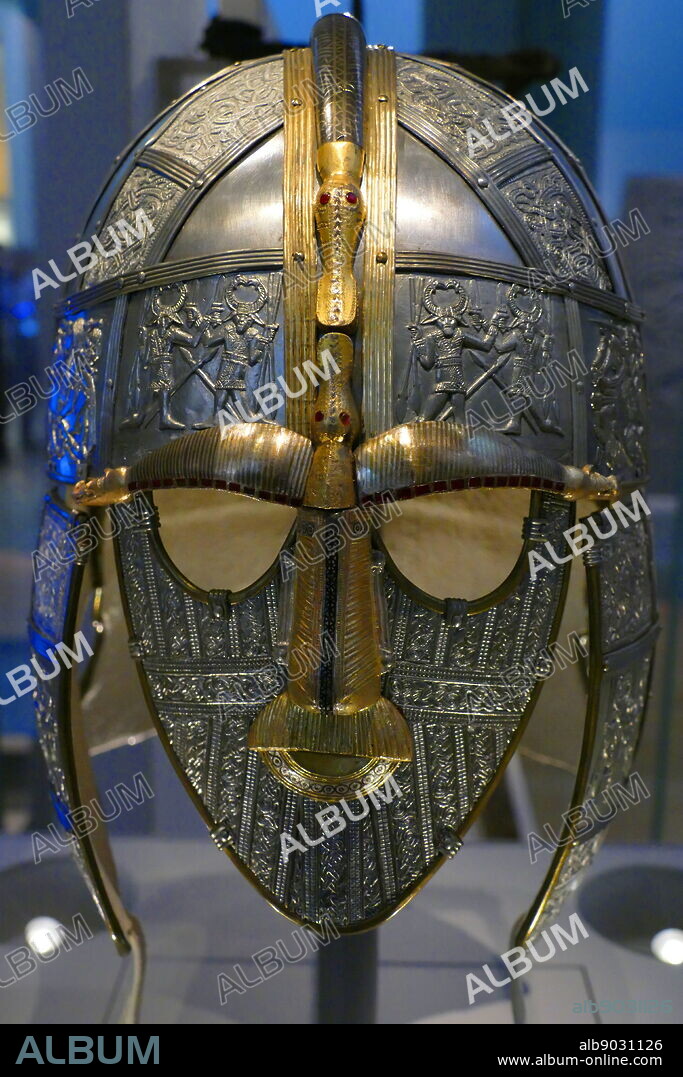 reconstruction of the Sutton Hoo helmet, a decorated Anglo-Saxon helmet discovered during the 1939 excavation of the Sutton Hoo ship-burial. Buried around 625 AD. it is believed to have been the helmet of King Raedwald; for whom its elaborate decoration may have given it a secondary function almost akin to a crown.