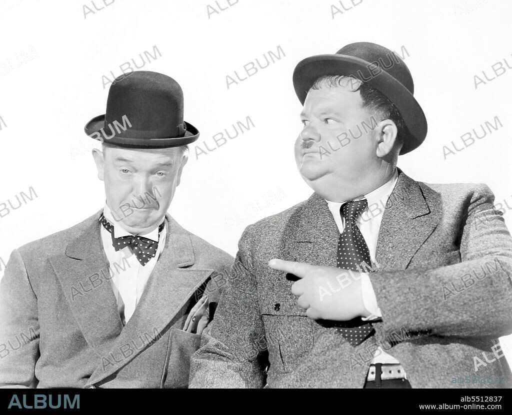 OLIVER HARDY and STAN LAUREL in THE BIG NOISE, 1944, directed by MALCOLM ST. CLAIR. Copyright 20TH CENTURY FOX.