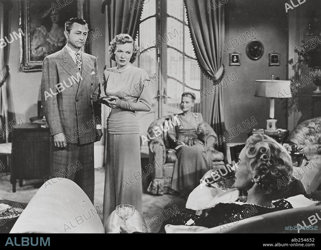 RITA JOHNSON and ROBERT YOUNG in THEY WON'T BELIEVE ME, 1947, directed by IRVING PICHEL. Copyright RKO.