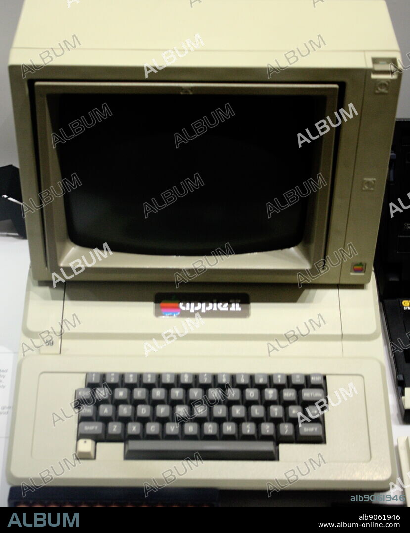 Desktop Computer from 1977. An example of the 1st personal computer with colour graphics: 'The Apple II'. In 1976 Apple released their 1st computer, and this is based on that design. It established the desktop computer market.