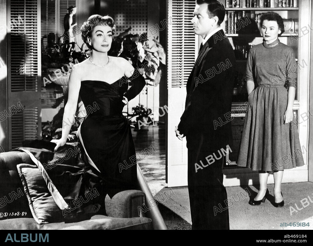 JOAN CRAWFORD, JOHN IRELAND and LUCY MARLOW in QUEEN BEE, 1955. Copyright COLUMBIA PICTURES.