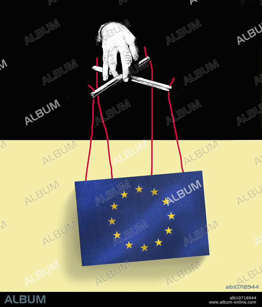 Hand holding puppet strings of European Union flag.