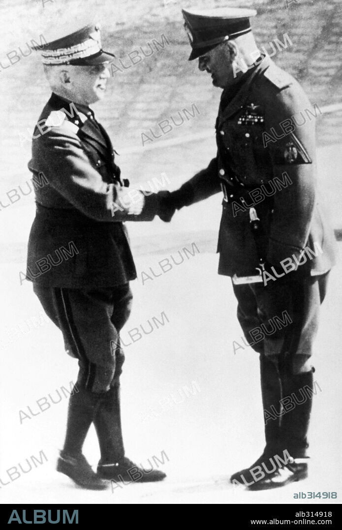 Mussolini shaking hands with King Vittorio Emanuele, who remained head of State throughout the fascist dictatorship. 13th June 1939.