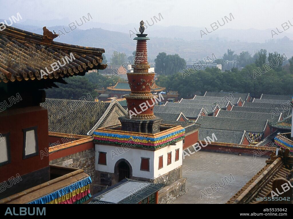 The Puning Temple (Chinese: ???; pinyin: Puníng Sì; literally: 'Temple of Universal Peace' and commonly called the Big Buddha Temple) is a Qing dynasty era Buddhist temple complex built in 1755, during the reign of the Qianlong Emperor (1735-1796 CE) to show the Qing's respect for Tibetan Buddhism. In 1703, Chengde was chosen by the Kangxi Emperor as the location for his summer residence. Constructed throughout the eighteenth century, the Mountain Resort was used by both the Yongzheng and Qianlong emperors. The site is currently an UNESCO World Heritage Site. Since the seat of government followed the emperor, Chengde was a political center of the Chinese empire during these times. Chengde, formerly known as Jehol, reached its height under the Qianlong Emperor 1735-1796 (died 1799). The great monastery temple of the Potala, loosely based on the famous Potala in Lhasa, was completed after just four years of work in 1771. It was heavily decorated with gold and the emperor worshipped in the Golden Pavilion. In the temple itself was a bronze-gilt statue of Tsongkhapa, the Reformer of the Gelugpa sect.