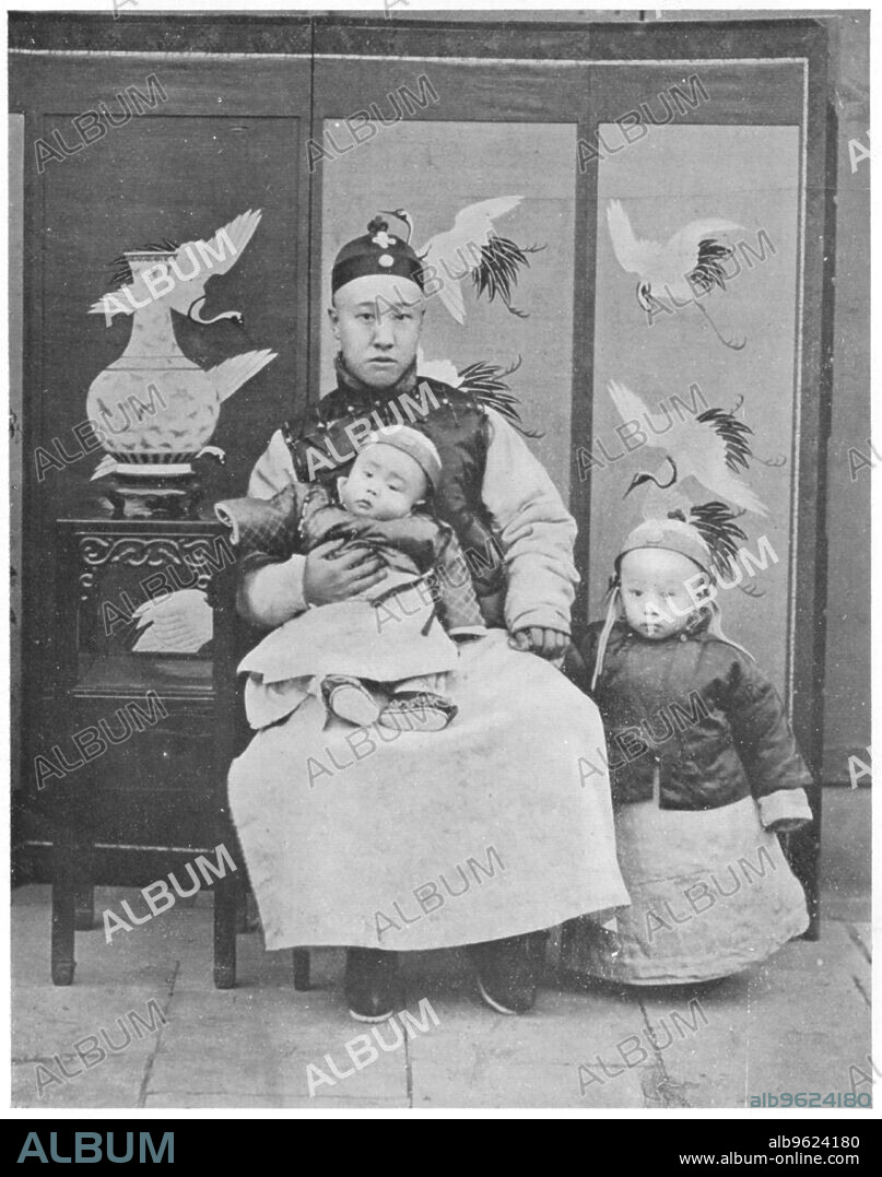 ANON. Henry P'u-i, c1910. Henry P'u-i (1906-1967) (Pu-Yi) the last emperor of China (1908-1912) whose Imperial titles were Hsuan-Tung and K'ang-Te. He holds the hand of his father Prince Ch'un who acted as Regent. The smaller child is P'u-i's brother P'u-Chieh.