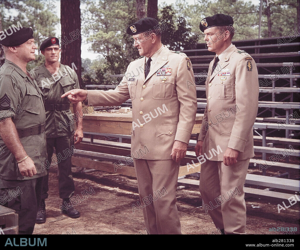 ALDO RAY and JOHN WAYNE in THE GREEN BERETS, 1968, directed by JOHN WAYNE and RAY KELLOGG. Copyright WARNER BROS/SEVEN ARTS.