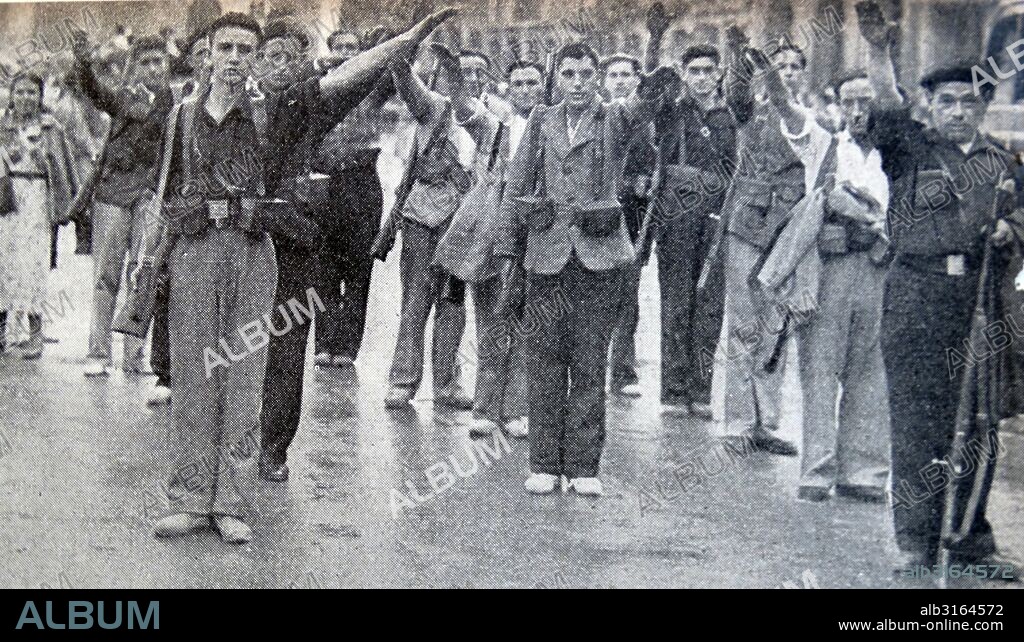 Falangist soldiers salute in a gathering in Pamplona during the Spanish Civil War. Dated 1936.