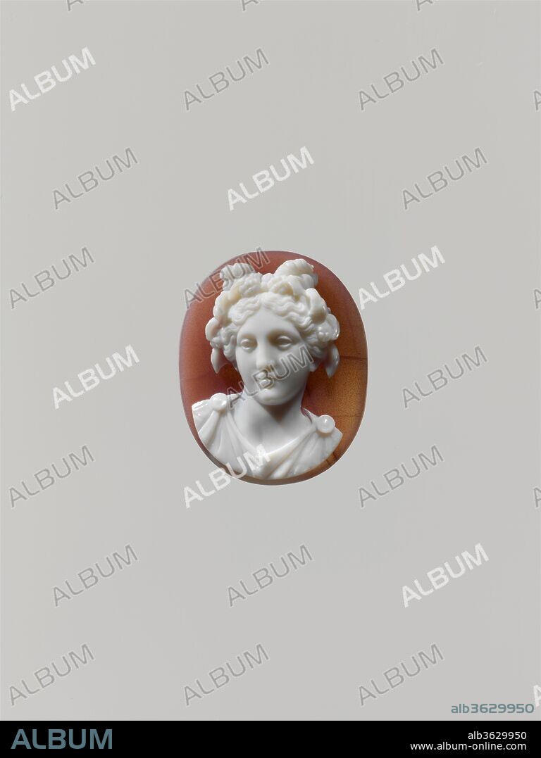 Thalia. Artist: Giuseppe Girometti (Italian, Rome 1780-1851 Rome). Culture: Italian, Rome. Dimensions: Overall (confirmed): 1 1/8 x 7/8 in. (2.8 x 2.3 cm); 28.4 x 22.8 x 9.5 mm. Date: second quarter 19th century.
This cameo reiterates the head of an ancient marble statue of Thalia, the muse of comedy, in the Vatican Museums' Sala delle Muse.