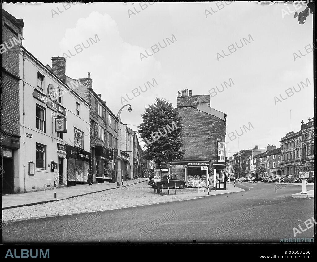 GEORGE BERNARD MASON. High Street, Skipton, Craven, North Yorkshire, 1957. A view from Caroline Square looking north, showing the buildings at the southern end of Sheep Street and the High Street.