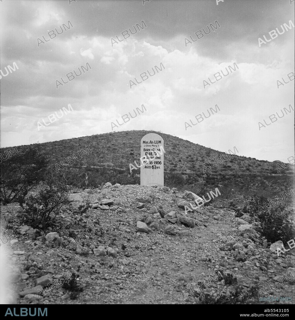 DOROTHEA LANGE. Sign near Tombstone, Arizona. Boot Hill graveyard. ['Mrs. Ah Lum (China Mary), born in China, died in Tombstone, Dec. 16 1906, aged 67 yrs'].