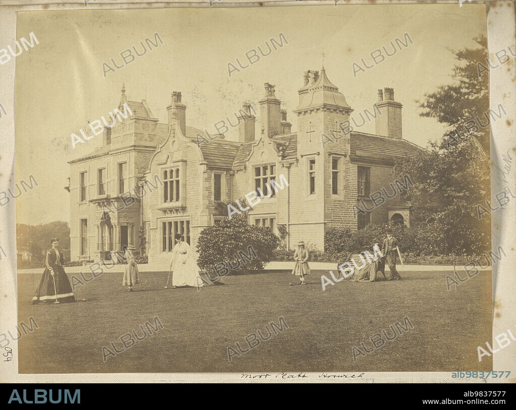Moor Platt, Chorley Old Road, Horwich, Bolton, c1860s. A group of women and children playing croquet on the lawn in front of Moor Platt. The house, dating from the early 19th century, was demolished following a fire in the 1920s. It was built for Joseph Ridgway, the son of the founder of the local bleachworks, and passed through his heirs to the Howarth family. A later house, also known as Moor Platt now occupies the site.