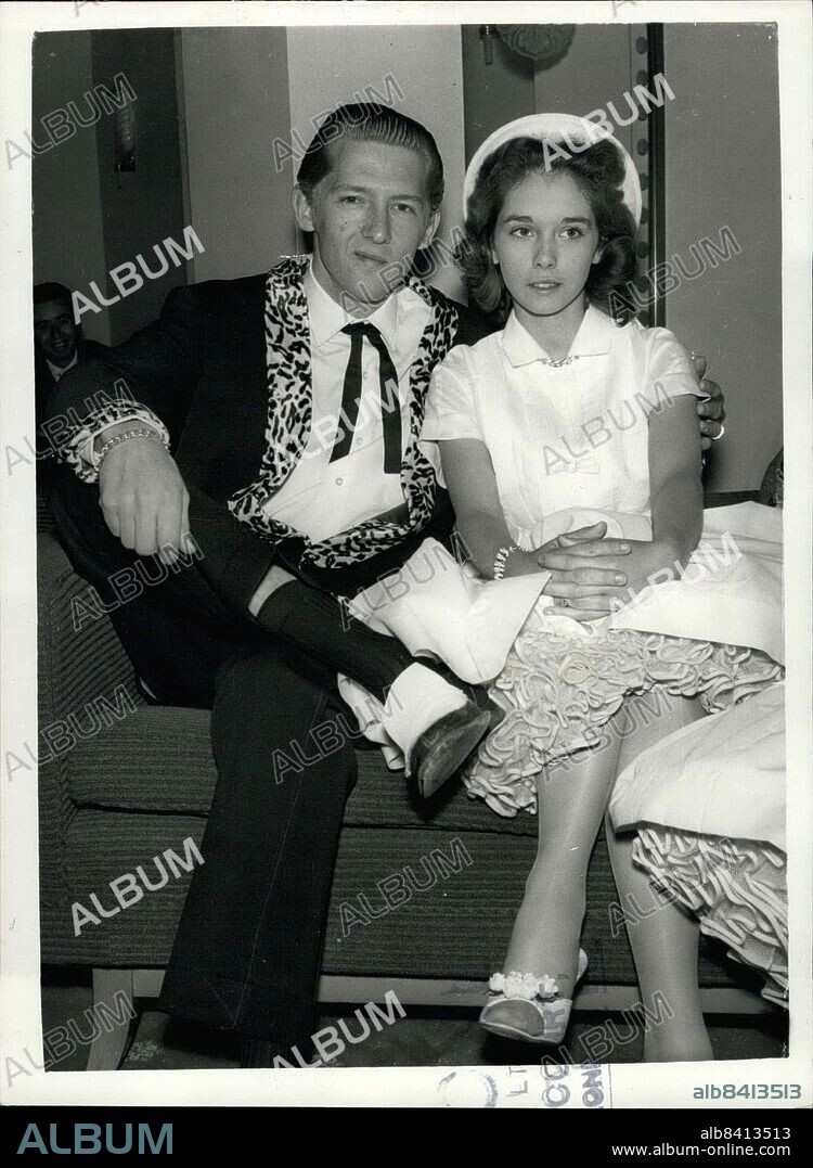May 26, 1958 - HOME OFFICE TO INVESTIGATE MARRIAGE OF JERRY LEE LEWIS. The Home Office is tomorrow to investigate the marriage muddle of the 22-year old America Rock n' Roll singer, Jerry Lee Lewis, who is here on a tour and his 13-year old wife, Myra. Lewis and Myra are staying in London. During the week-end it was discovered that their marriage last December was five months before his divorce from his second wife became final. Myra's father, Mr. J.W. Brown, his wife, Lois and his son, are staying at the same hotel, in London. Home Office officials will look into the marriage when Lewis's landing papers are forwarded from the Immigration Office. Keystone Photo Shows:- Yesterday's picture of Jerry Lee Lewis and his 13-year old wife, Myra. (Credit Image: © Keystone Pictures USA/ZUMAPRESS.com).