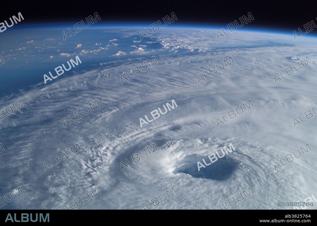 Close-up view of the eye of Hurricane Isabel was taken by one of the Expedition 7 crew members onboard the International Space Station (ISS). "It is quite interesting to look at storms, said Ed Lu, Expedition 7 science officer. "When you see a large cyclone, you can see the spiral structure, and you can actually see - if there is a hurricane - you actually see the eye of the hurricane. You can look right down into it if you are lucky enough to go right over the top.".