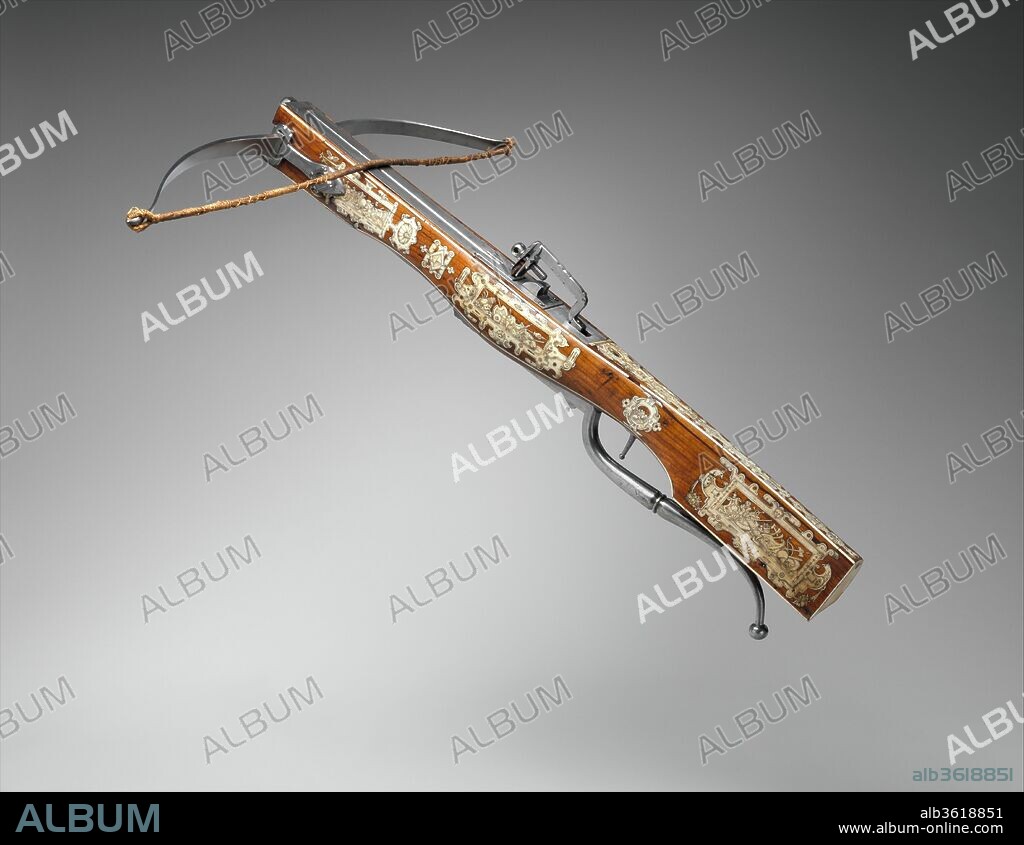 Pellet and Bolt Crossbow Combined with a Wheel-Lock Gun. Culture: Central European; possibly Southern German or Austrian. Designer: Decoration based on designs by Jacob Floris (1524-1581) , published in Antwerp in 1564.. Dimensions: L. 28 1/2 in. (72.4 cm); W. 26 1/2 in. (67.2 cm); Wt. 11 lb. 7 oz. (5,197 g). Date: ca. 1570-1600.
The inlay of polished and engraved staghorn featuring trophies of arms is based on designs by Jacob Floris (1524-1581), which were published in Antwerp in 1564. The bow is a later replacement.