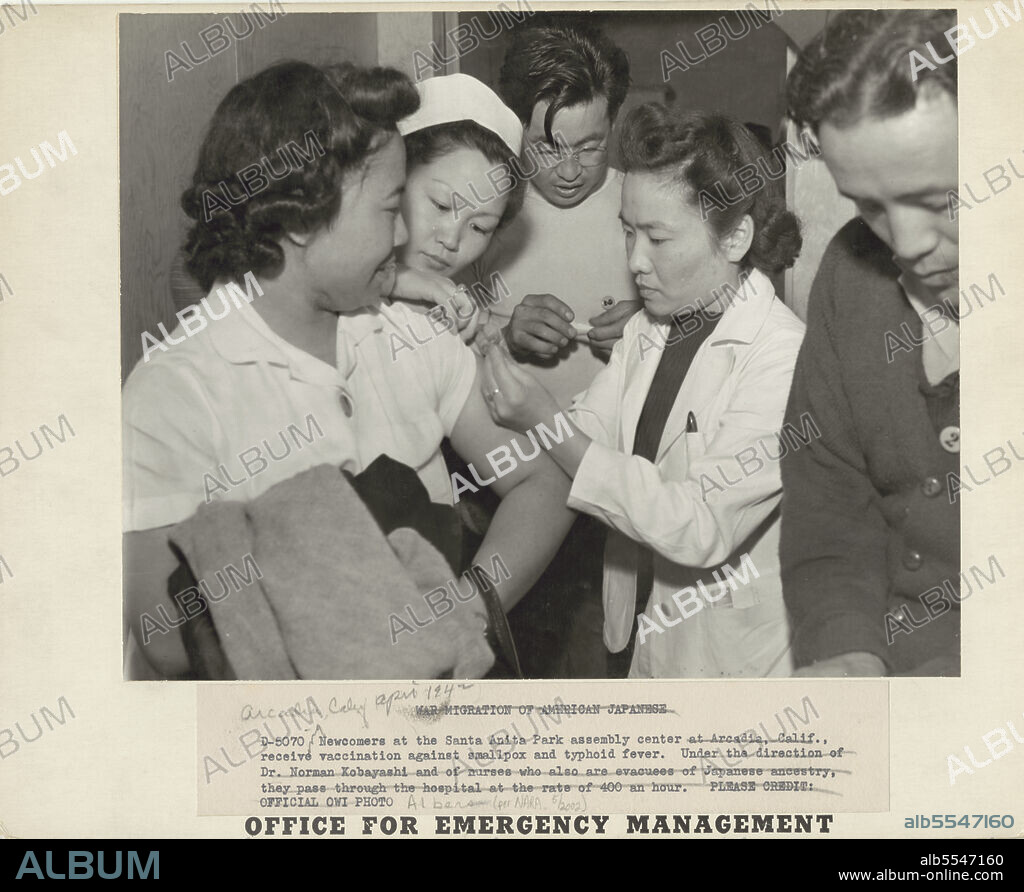 DOROTHEA LANGE. Japanese relocation, California. Newcomers at Santa Anita Park Assembly Center in Arcadia, California, receive vaccination against smallpox and typhoid fever. Under direction of Dr. Norman Kobayshi and nurses who also are evacuees of Japanese ancestry, they pass through the hospital at a rate of 400 an hour. Evacuees are transferred later to War Relocation Authority centers for the duration.