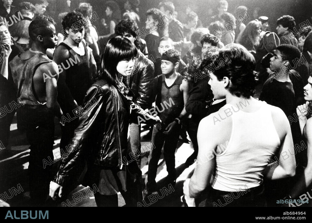 RICHARD PANEBIANCO y SARI CHANG en CHINA GIRL, 1987, dirigida por ABEL FERRARA. Copyright VESTRON PICTURES.