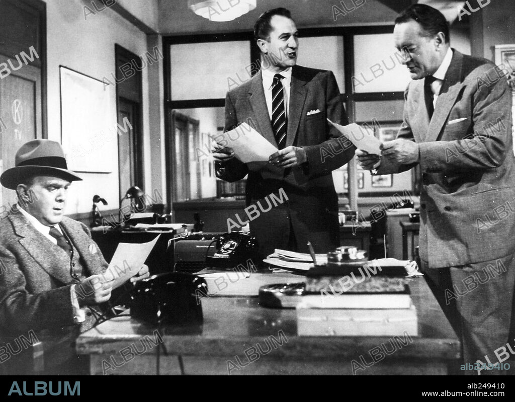 GEORGE SANDERS, THOMAS MITCHELL and VINCENT PRICE in WHILE THE CITY SLEEPS, 1956, directed by FRITZ LANG. Copyright RKO.