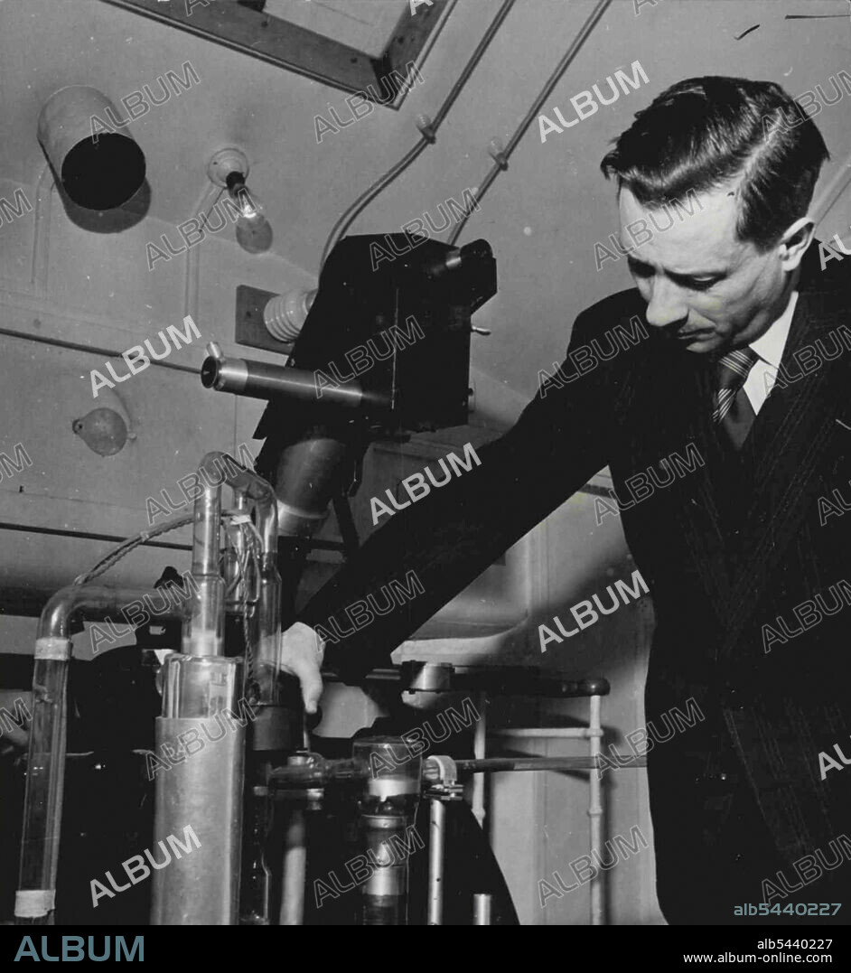 French Electronic Telescope -- M. Andre Lallemand is shown here examining portion of his development electron telescope. US rights for the instruments have been assigned to the Scientific Research Institute of New York. Following on the widespread acceptance of the electron microscope, a French astronomer, M. Andre Lallemande, has announced the development of an electron telescope which is claimed to have great possibilities. The new telescope needs perfecting, but it has already allowed good ph.