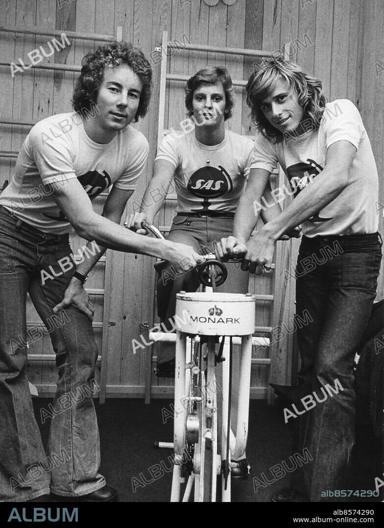 STOCKHOLM 19741107 . Ingemar Stenmark ( slalom legend), Ulrika Knape (successful Swedish diver winning Olympic gold ) and Tennis legend Bjorn Borg photographed by a exercise bike. in the Royal Tennis Hall in Stockholm in 1974. Photo SCANPIX Code 20360.