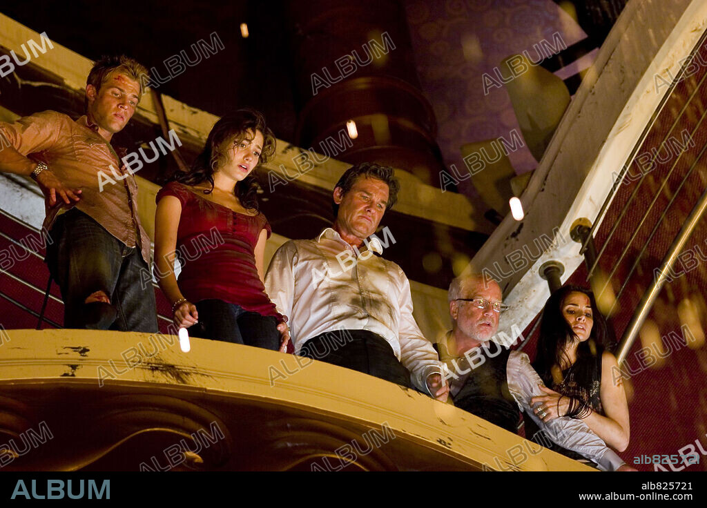 EMMY ROSSUM, KURT RUSSELL, MIKE VOGEL and RICHARD DREYFUSS in POSEIDON, 2006, directed by WOLFGANG PETERSEN. Copyright WARNER BROS.