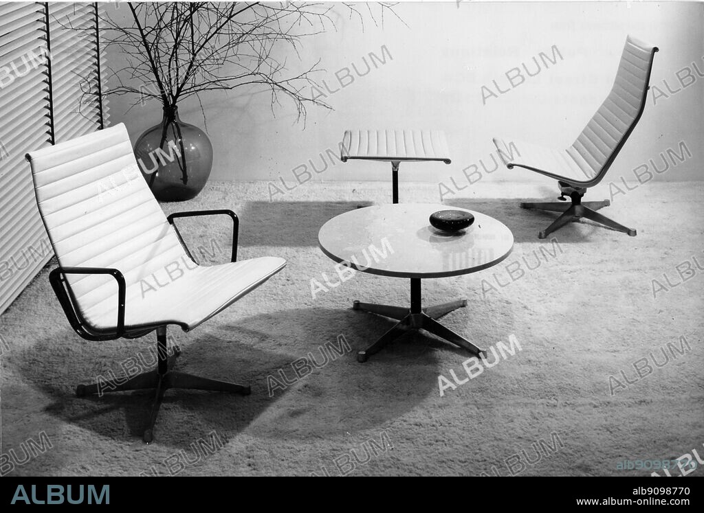 The Aluminium Group by Hille. The Aluminium Group is the Charles Eames design now being made by Hille of London under licence from the Herman Miller Company of the United States. The slim and delicate lines of the frames of the chairs are aluminium.