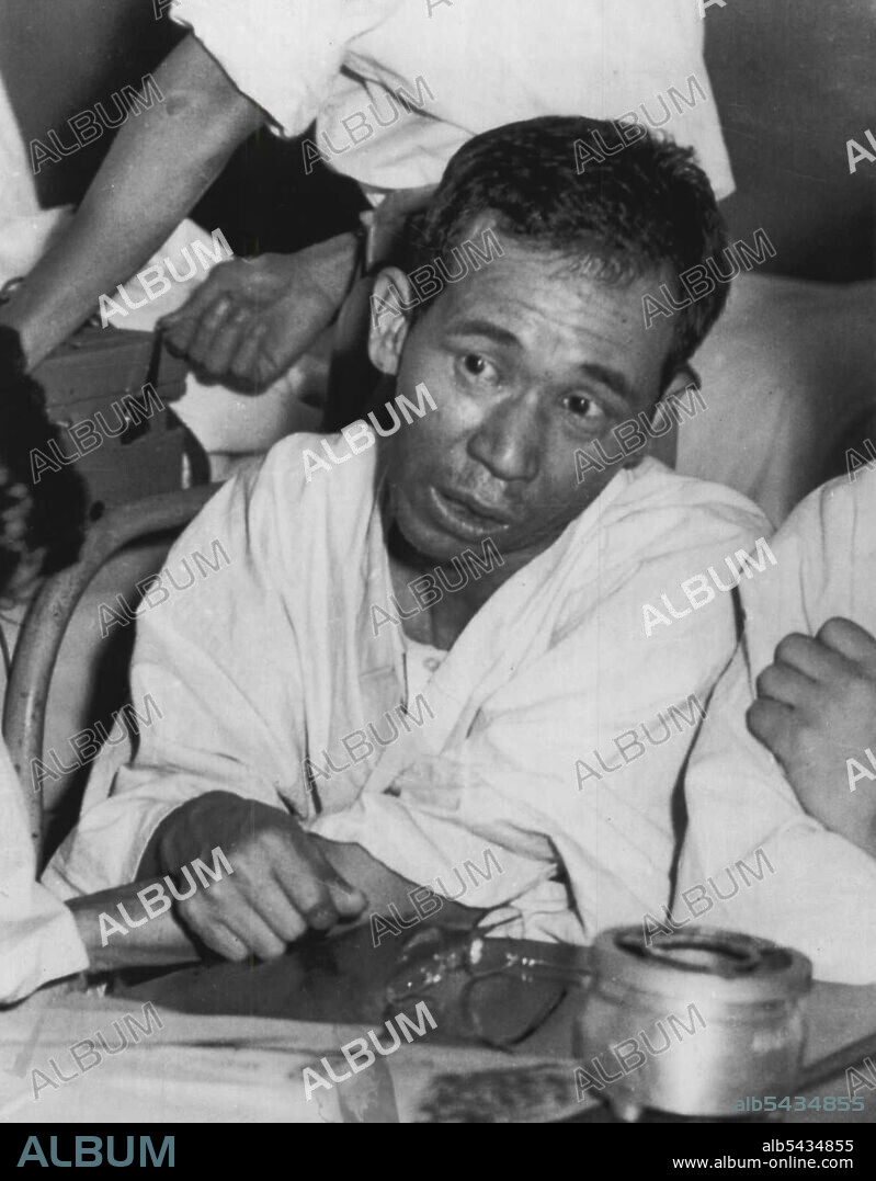 Japanese H-bomb Victim -- Aikichi Kuboyama, 39, who was aboard the Japanese fishing vessel "Lucky Dragon" when it was burned by ash from an American H-Bomb blast, talks with newsmen during an interview where he and 21 other members of the crew are being treated, in Tokyo. This picture was taken recently, but he has since become worse and has been in a coma more than 30 hours. His condition is critical. September 1, 1954. (Photo by AP Wirephoto).