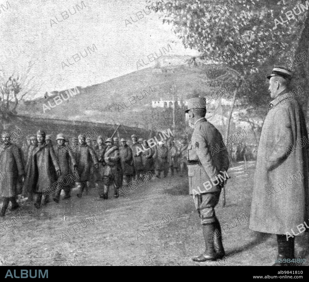 'French success on the Italian front; Parade of Austrian prisoners', 1917. From "L'Album de la Guerre 1914-1919, Volume 2" [L'Illustration, Paris, 1924].